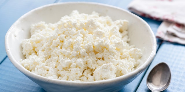 Woman celebrates 7-year-old cottage cheese she's kept in office fridge throughout job 5