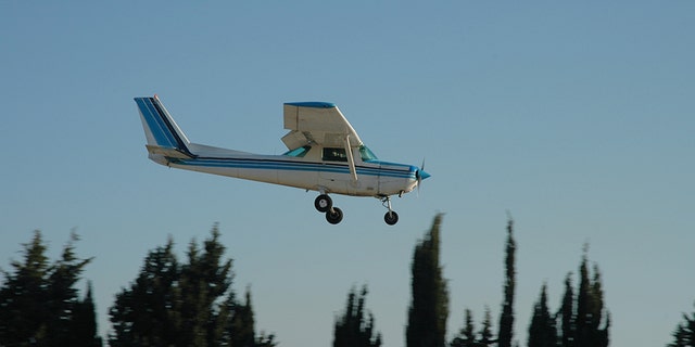 A Cessna 152 lowers toward the ground. Max Sylvester was forced to make an emergency landing on Saturday afternoon after his flight instructor, Robert Mollard blacked out mid-flight.
