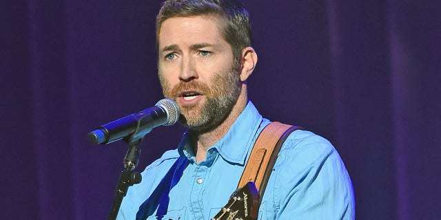 Josh Turner performs in Nashville, Tenn., in March 2018. A tour bus carrying his crew crashed in September 2019, killing one and injuring seven. NASHVILLE, TN - MARCH 27: Singer/Songwriter Josh Turner performs during Daryle Singletary Keepin' It Country Tribute Show at Ryman Auditorium on March 27, 2018 in Nashville, Tennessee. (Photo by R. Diamond/Getty Images)