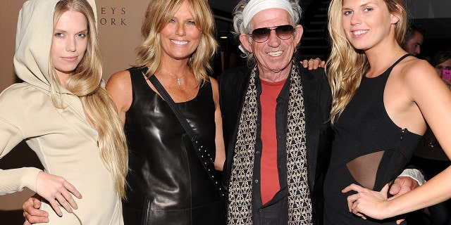 NEW YORK, NY - SEPTEMBER 22: (L-R) Theodora Richards, Patti Hansen, Keith Richards, and Alexandra Richards attend the celebration of the launch of Hung on U with Patti Hansen hosted by Barneys New York on September 22, 2011 in New York City. (Photo by Jamie McCarthy/WireImage for Barneys New York)