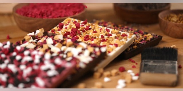 The new hand-crafted chocolate bars, which come eight “fingers” long, are called “Create Your Break,” and allow customers to choose three special add-ins from a long list, and one chocolate variation from a selection of milk, dark, white and ruby.