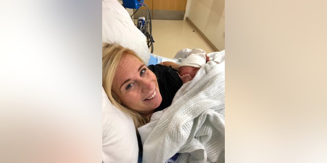 Brooke, pictured with baby Paloma, forced her husband to pull over en route to the hospital.