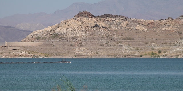 A lingering 20-year drought has caused water levels in Lake Mead to drop, triggering mandatory water cuts for Arizona and Nevada next year.