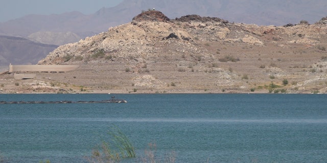 A lingering 20-year drought has caused water levels in Lake Mead to drop, triggering mandatory water cuts for Arizona and Nevada next year.