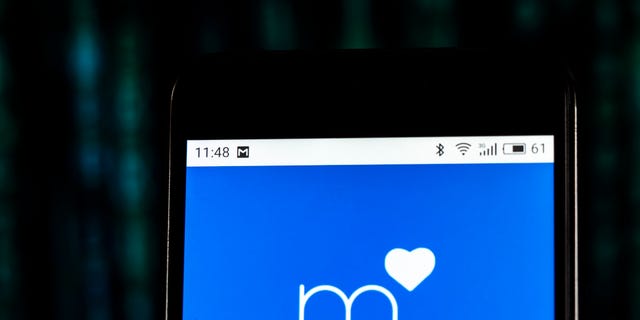 In this photo illustration, the Match.com logo seen displayed on a smartphone. (Photo Illustration by Igor Golovniov/SOPA Images/LightRocket via Getty Images)
