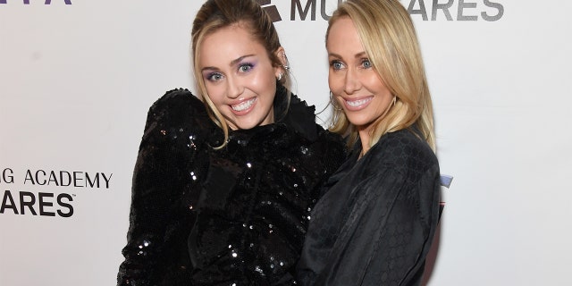 Miley Cyrus' mom, Tish, called the 26-year-old pop star a "bratty millennial." (Photo by Kevin Mazur/Getty Images for The Recording Academy)