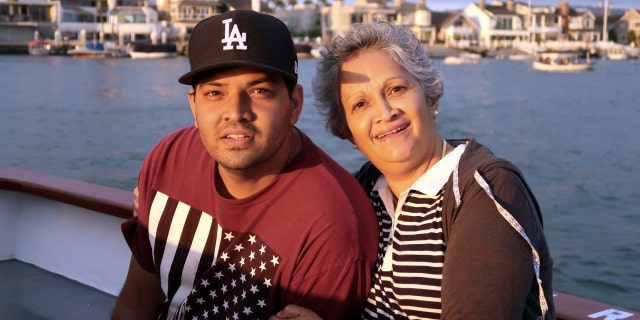 Kenneth French and his mother, Paola French.  (Louana D'Cunha via AP, file)