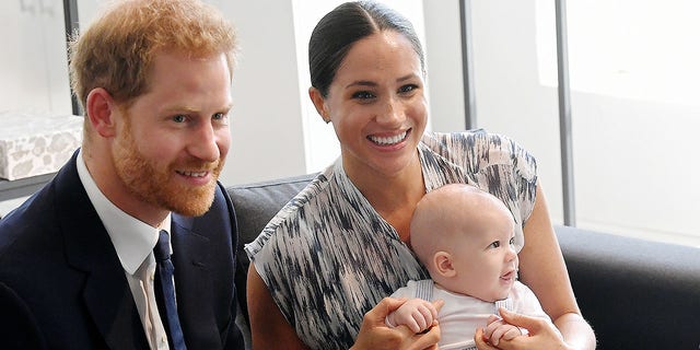 Britain's Duke and Duchess of Sussex, Prince Harry and his wife Meghan Markle hold their baby son Archie as they meet with Archbishop Desmond Tutu at the Tutu Legacy Foundation in Cape Town on Sep. 25, 2019. 