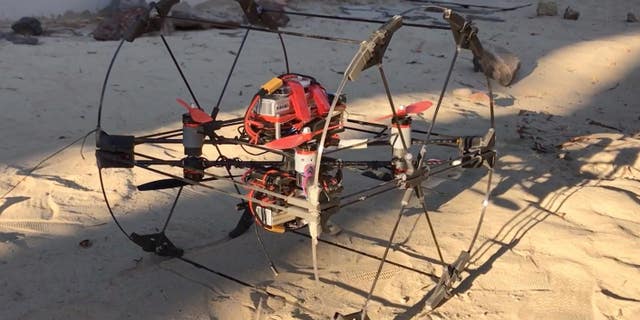 A prototype of the transforming robot Shapeshifter is tested in the robotics yard at NASA's Jet Propulsion Laboratory.