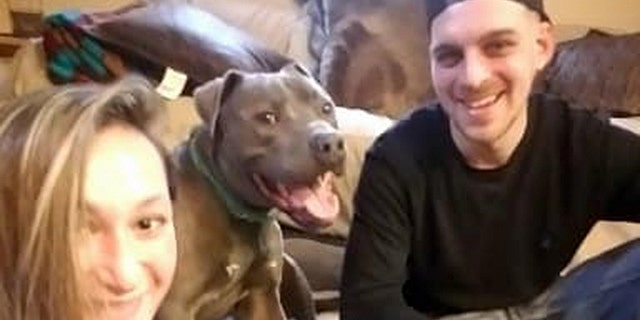 Rex with his owners Elana Greenfield and Dominic Primerano