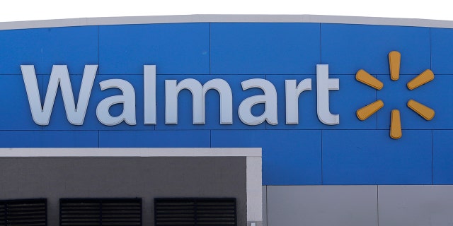 Walmart is going back to its folksy hunting heritage and getting rid of anything that's not related to a hunting rifle after two mass shootings in its stores in one week left 24 people dead in August of 2019. (AP Photo/Steven Senne)