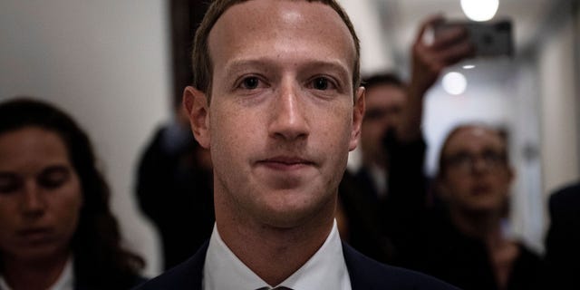 Zuckerberg walks to meetings for technology regulations and social media issues on Sept. 19, 2019, in Capitol Hill, Washington, D.C. 