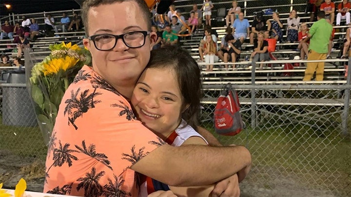 Heartwarming video shows boy with Down syndrome ask girlfriend to homecoming