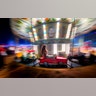 A girl rides on a merry go round at an autumn fair in Rosiorii de Vede, Romania, Sept. 7, 2019.?