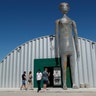 People enter and exit the Alien Research Center as preparations continue for "Storm Area 51" in Hiko, Nevada, Sept. 18, 2019.