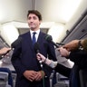 Canadian Prime Minister Justin Trudeau makes a statement on his campaign plane in regards to a photo coming to light of himself from 2001, wearing "brownface," in Halifax, Nova Scotia, Sept. 18, 2019. 