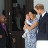 Britain's Prince Harry and Meghan, Duchess of Sussex, hold their son Archie as they meet Anglican Archbishop Emeritus, Desmond Tutu and his wife Leah in Cape Town, South Africa, Sept. 25, 2019. 