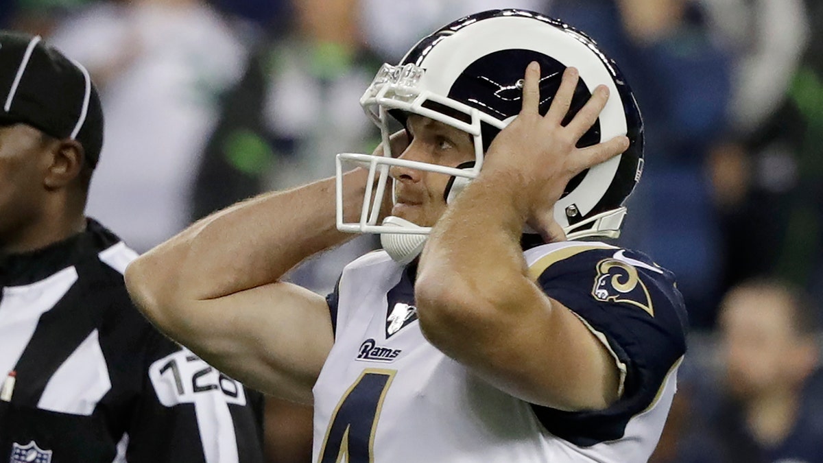 Los Angeles Rams' Greg Zuerlein reacts after he missed a field goal in the final seconds of the team's NFL football game against the Seattle Seahawks, Thursday, Oct. 3, 2019, in Seattle. The Seahawks won 30-29. (AP Photo/Elaine Thompson)