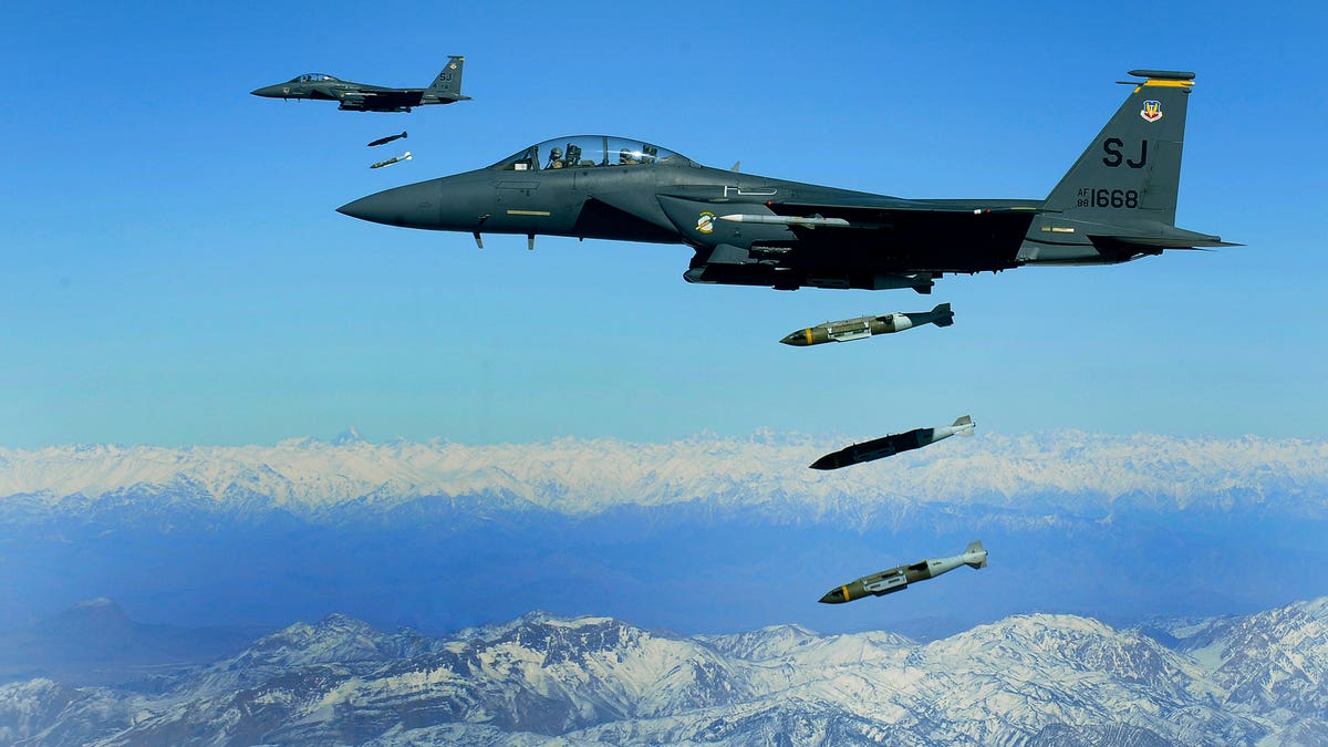 U.S. Air Force F-15E Strike Eagles drop 2,000-pound munitions on a cave in eastern Afghanistan in 2009. (U.S. Air Force/Staff Sgt. Michael B. Keller)
