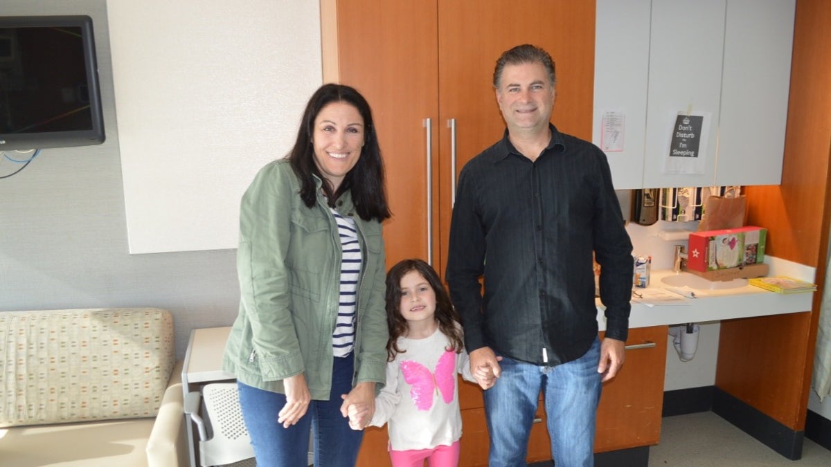 Sophia and her parents shortly before they left the hospital.