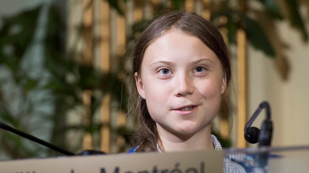 Swedish climate activist Greta Thunberg speaks to reporters after receiving the key to the city of Montreal during a ceremony in Montreal last month. (Graham Hughes/The Canadian Press via AP)