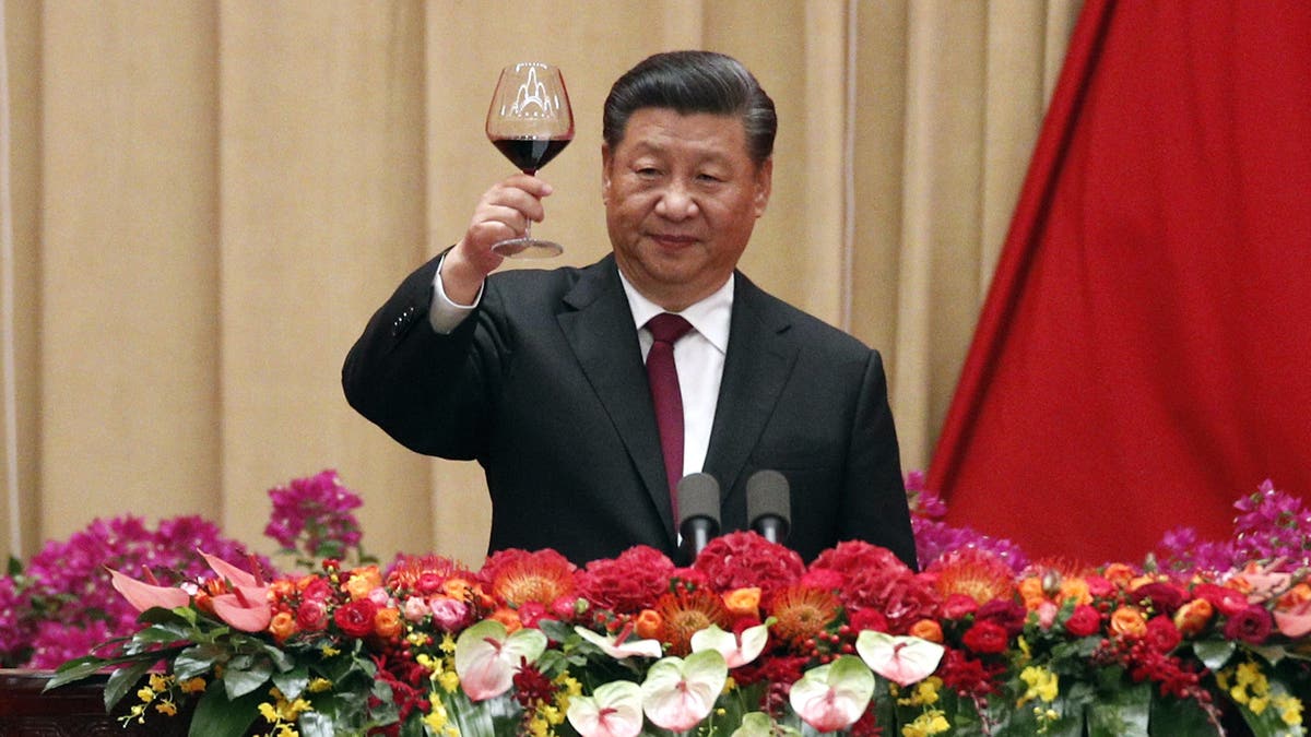 Chinese President Xi Jinping after delivering his speech at a dinner marking the 70th anniversary of the founding of the People's Republic of China at the Great Hall of the People in Beijing, Monday, Sept. 30, 2019. (AP Photo/Andy Wong)