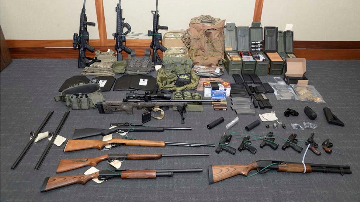 A photo of firearms and ammunition found in Hasson's Silver Spring, Md. home. (Maryland U.S. District Attorney's Office via AP, File)