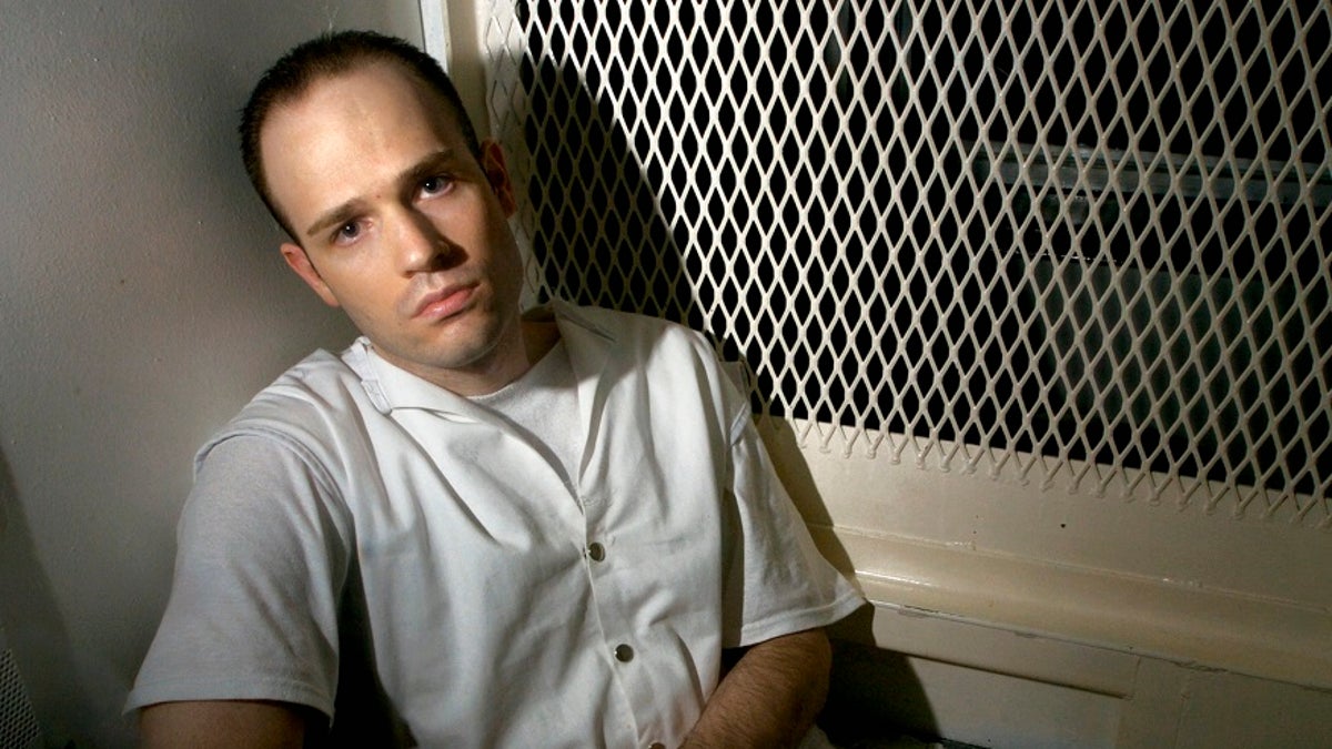 In this Dec. 3, 2003, photo, death row inmate Randy Halprin, then 26, sits in a visitation cell at the Polunsky Unit in Livingston, Texas. (AP Photo/Brett Coomer, File)