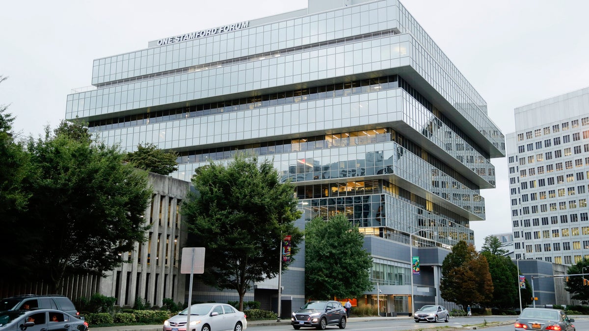 In this Sept. 12 photo, cars pass Purdue Pharma headquarters in Stamford, Conn. How much members of the Sackler family should be held accountable for the role their company, Purdue Pharma, played in the nation’s opioid crisis will be at the center of a hearing in federal bankruptcy court. (AP Photo/Frank Franklin II, File)