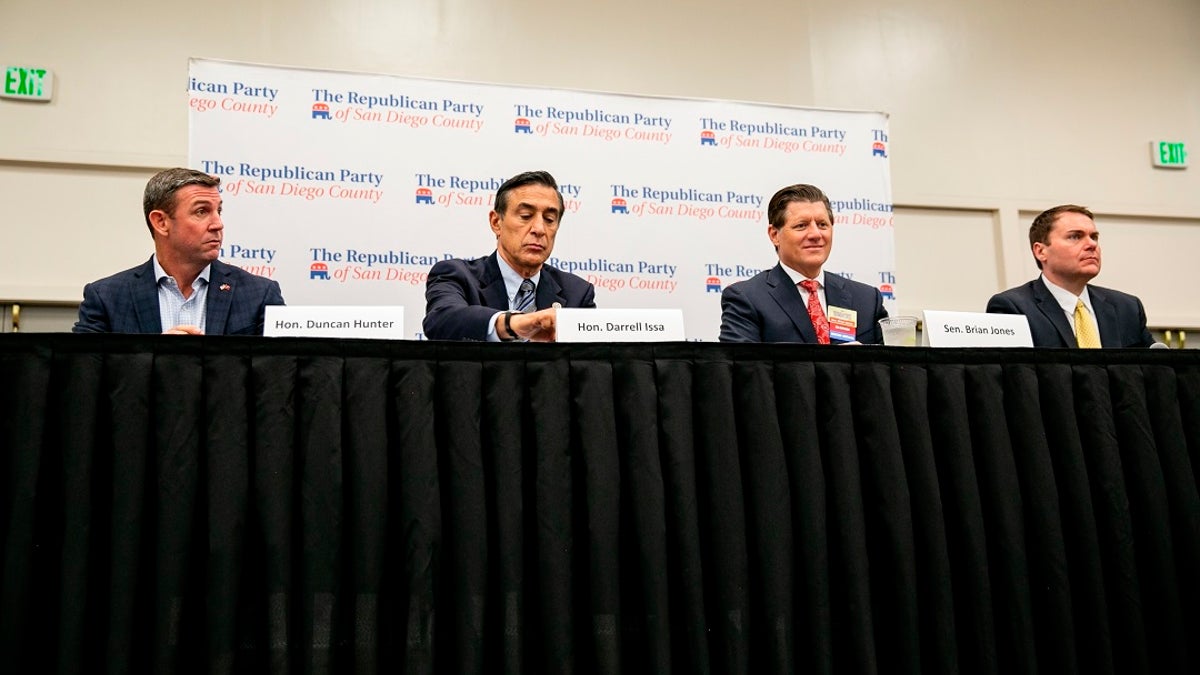 In this Monday photo, Republican candidates for the 50th congressional district, from left, Congressman Duncan Hunter, former Congressman Darrell Issa, state Sen. Brian Jones, and former city councilman Carl DeMaio, take part in a candidate forum sponsored by the Republican Party of San Diego County. (Sam Hodgson/The San Diego Union-Tribune via AP)