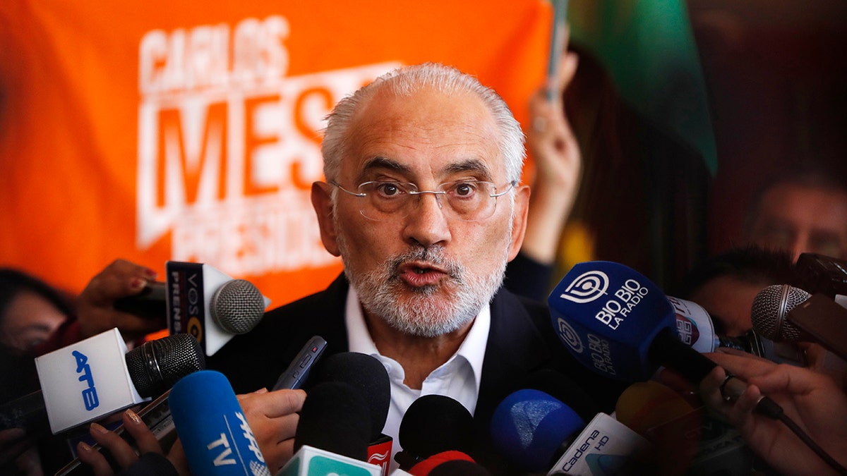 Bolivia's opposition presidential candidate Carlos Mesa talks during a press conference at a hotel in La Paz.