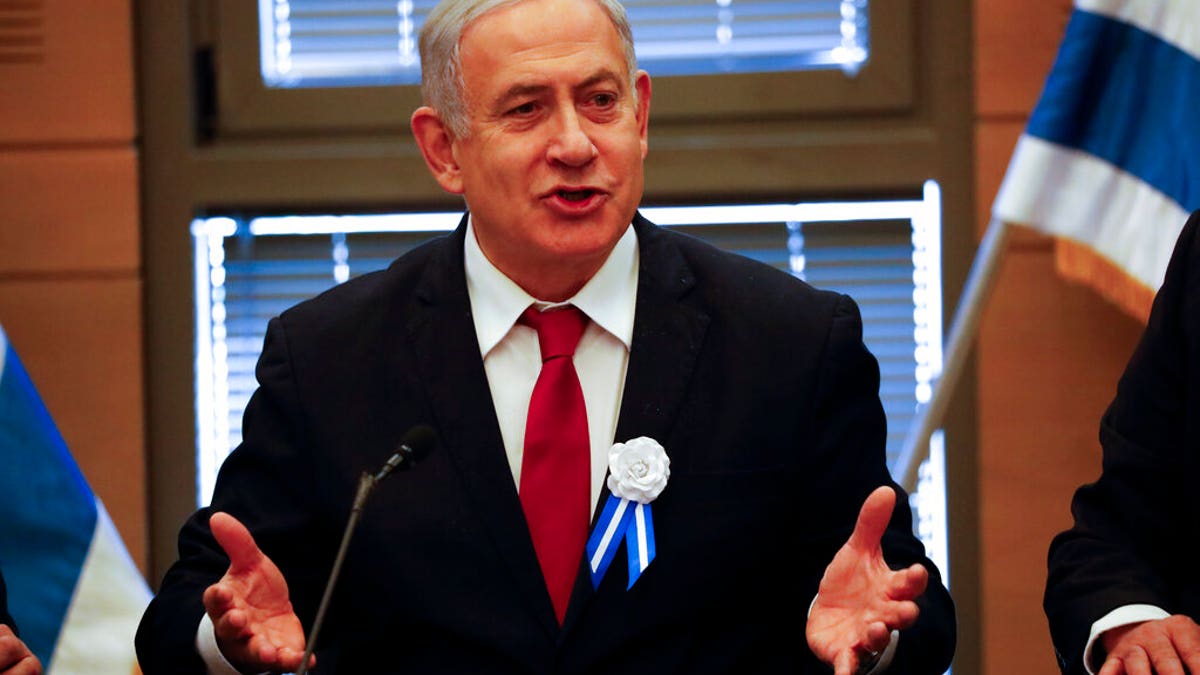 FILE: Israeli Prime Minister Benjamin Netanyahu speaks during his party's faction meeting in Jerusalem.