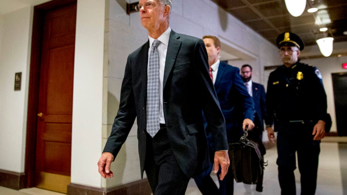 Ambassador William Taylor arriving for a closed-door meeting to testify as part of the House impeachment inquiry into President Trump on Oct. 22. House investigators are bringing Taylor back for a public hearing on Wednesday.