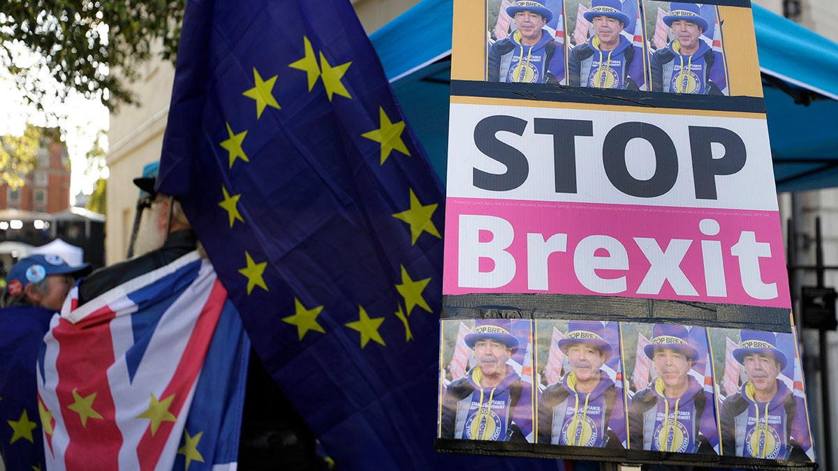 An anti-Brexit demonstrators banner near Parliament in London, Tuesday, Oct. 22, 2019. 