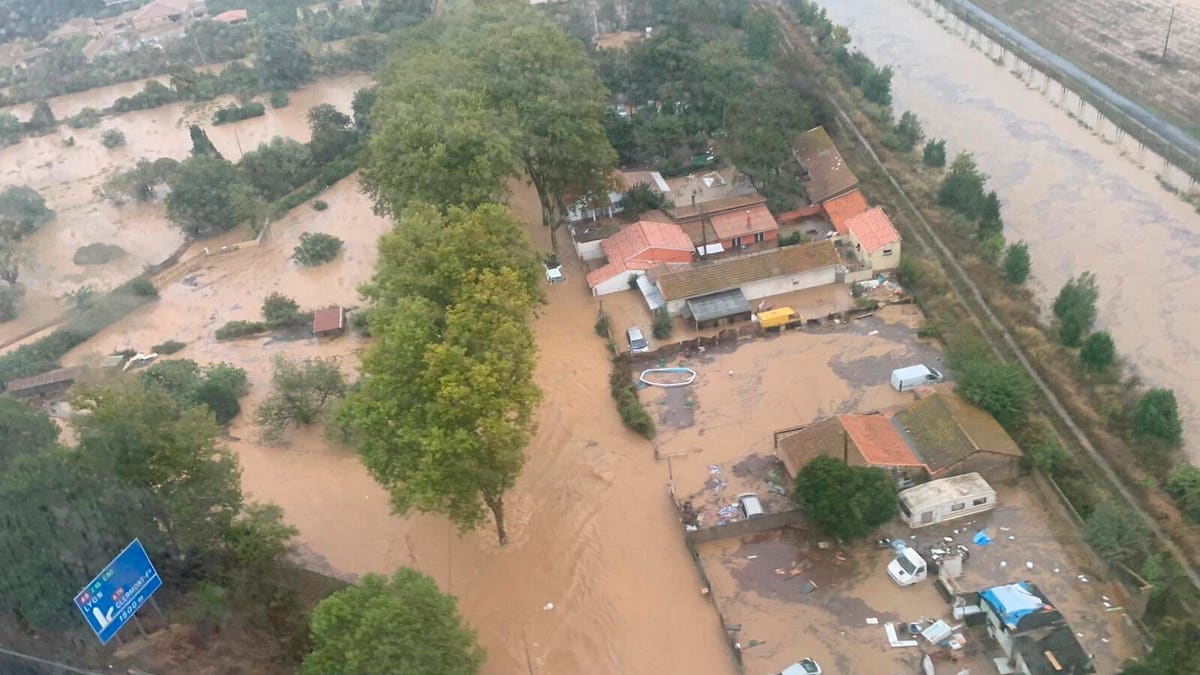 This Oct. 23, 2019 image made by Twitter user @SDIS34 shows a flooded area in the southern France. France's Interior ministry says three people have been killed in torrential rains that flooded towns and villages in southern France this week.