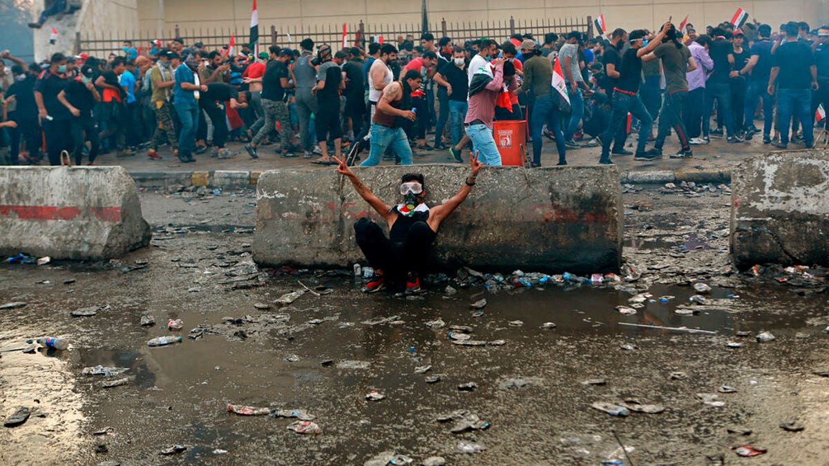 Anti-government protesters gather in Tahrir Square during a demonstration in central Baghdad