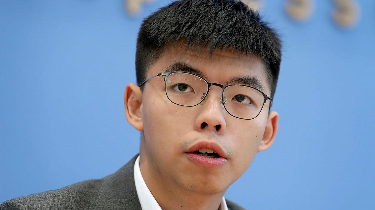 In this Sept. 11, 2019, file photo, Hong Kong activist Joshua Wong addresses the media during a press conference in Berlin, Germany.