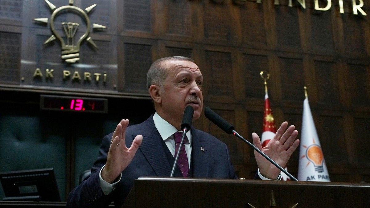 Turkish President Recep Tayyip Erdogan addresses his ruling party  on Wednesday. (AP Photo/Burhan Ozbilici)