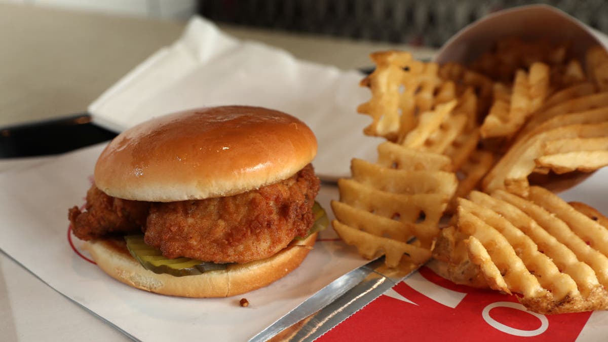 A chicken sandwich with waffle fries is pictured at a Chick-Fil-A restaurant.