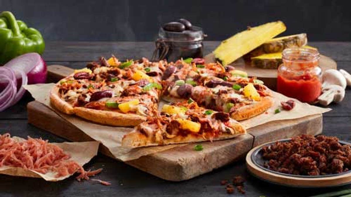 Domino’s Australia debuted four vegan-friendly pizzas on Monday — the same day Patrick Hukins was assured he was eating one of the plant-based pies.