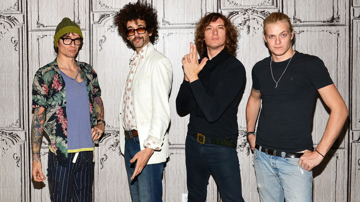 NEW YORK, NY - OCTOBER 27: (L-R) Justin Hawkins, Frankie Poullain, Dan Hawkins and Rufus Taylor of the band "The Darkness" visit AOL BUILD to discuss their new album "Last Of Our Kind" at AOL Studios In New York on October 27, 2015 in New York City. (Photo by Slaven Vlasic/Getty Images)