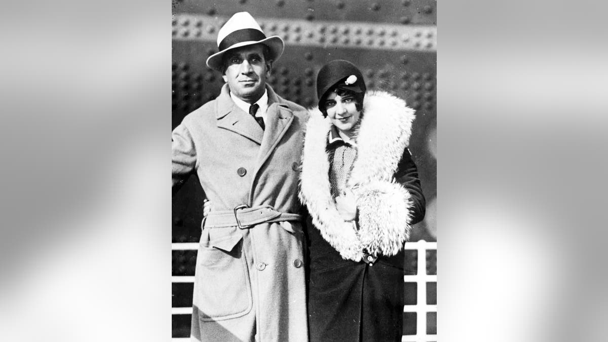 American actor and singer Al Jolson with his wife Ruby after their arrival at Cherbourg Harbour, France, on Aug. 29, 1928. (AP Photo)