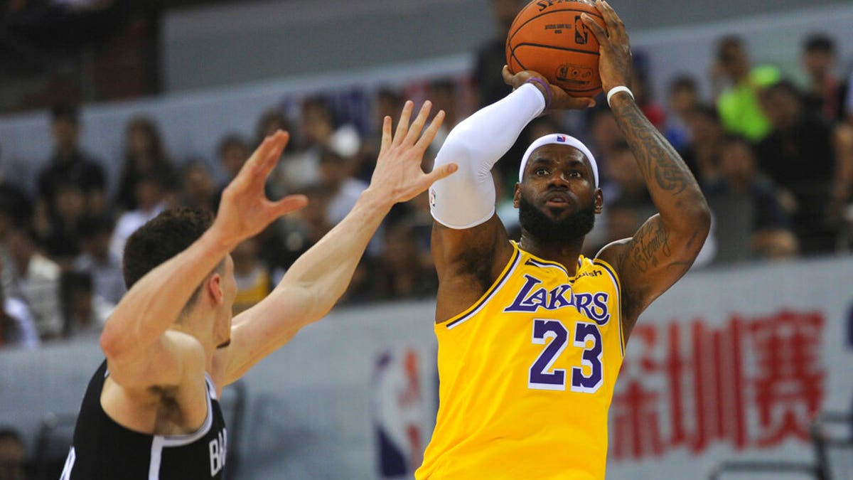 Los Angeles Lakers' LeBron James in action during a match against Brooklyn Nets at the NBA China Games 2019 in Shenzhen in south China's Guangdong province on Saturday, Oct. 12, 2019 (Color China Photo via AP)