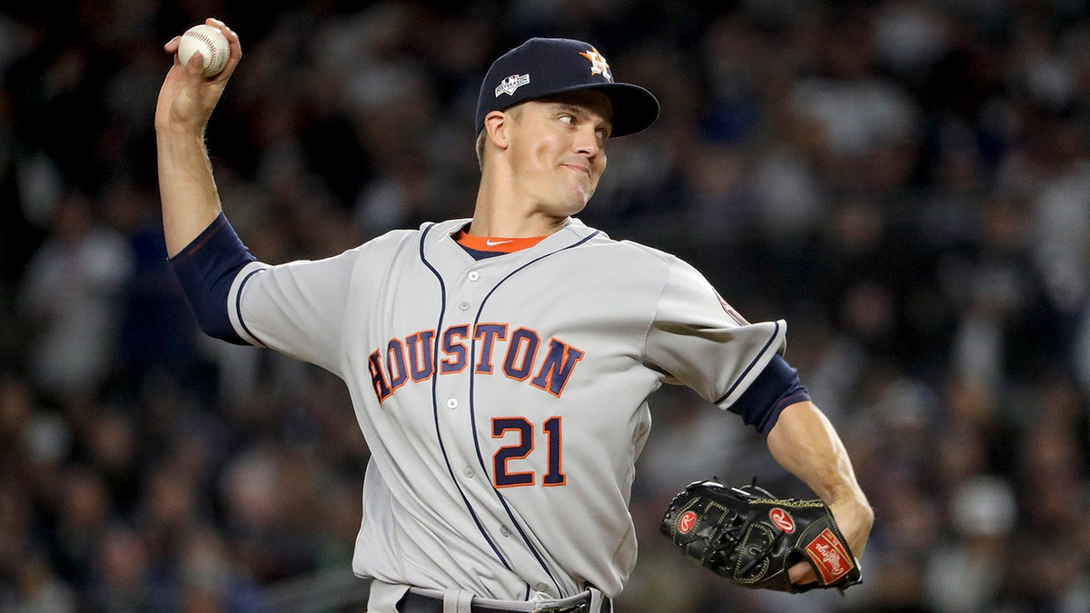 Houston Astros starting pitcher Zack Greinke (21) delivers against the New York Yankees during the first inning of Game 4 of baseball's American League Championship Series, Thursday, Oct. 17, 2019, in New York. (AP Photo/Frank Franklin II)