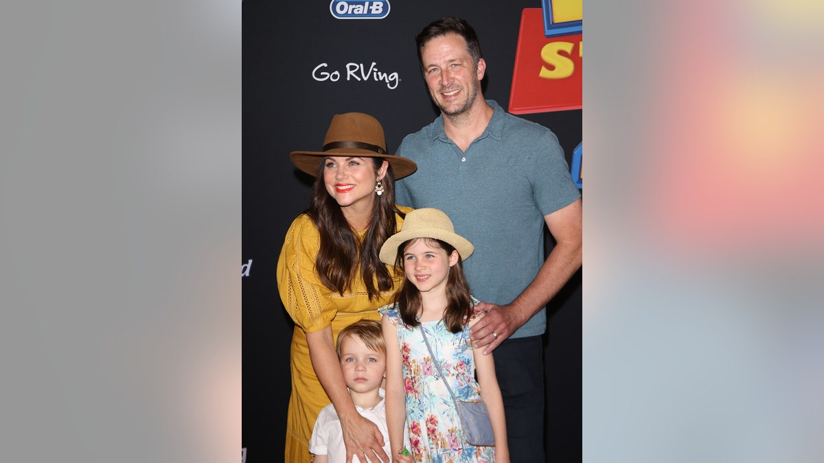 Tiffani Thiessen and family arrive at the Los Angeles premiere of Disney and Pixar's "Toy Story 4" held on June 11, 2019, in Los Angeles, California.
