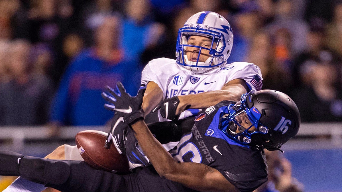 Boise State wide receiver John Hightower tries to get control of a long pass, but Air Force defensive back Milton Bugg III, top, breaks up the play on Friday, Sept. 20, 2019, at Albertsons Stadium in Boise, Idaho. The host Broncos won, 30-19. (Darin Oswald/Idaho Statesman/Tribune News Service via Getty Images)