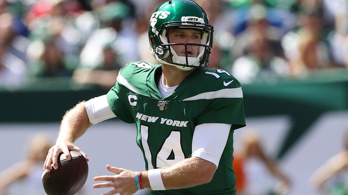 FILE - In this Sept. 8, 2019, file photo, New York Jets quarterback Sam Darnold (14) makes a pass during an NFL football game against the Buffalo Bills, in East Rutherford, N.J. (AP Photo/Steve Luciano, File)