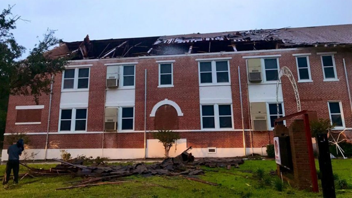 Damage at Kathleen Middle School can be seen after a tornado spawned by Tropical Storm Nestor impacted Florida late Friday.