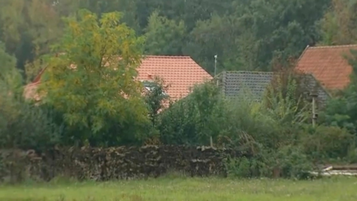 The small group of buildings after a family group were discovered to be living in secluded conditions in Ruinerwold, 80 miles northeast of Amsterdam, Netherlands, Tuesday Oct. 15, 2019.