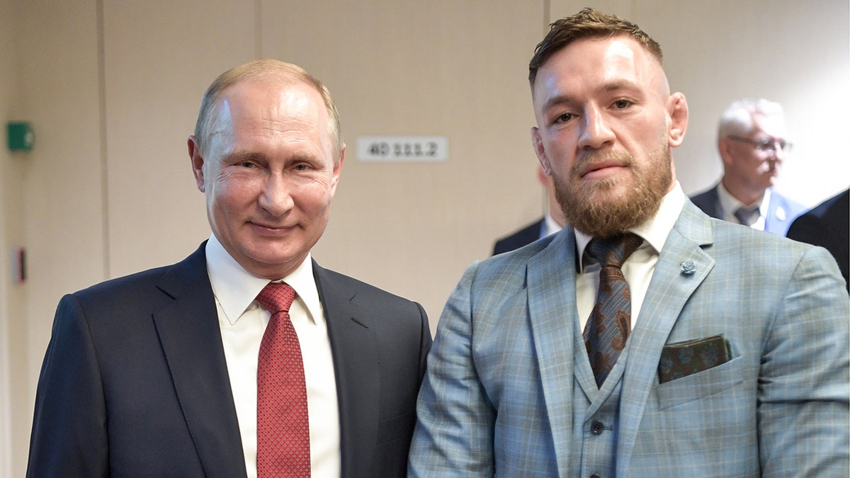 Russian President Vladimir Putin and Irish MMA fighter Conor McGregor at the final match of the 2018 FIFA World Cup in Russia.